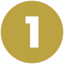 A circular gold medallion with the number “1” in white in the center.